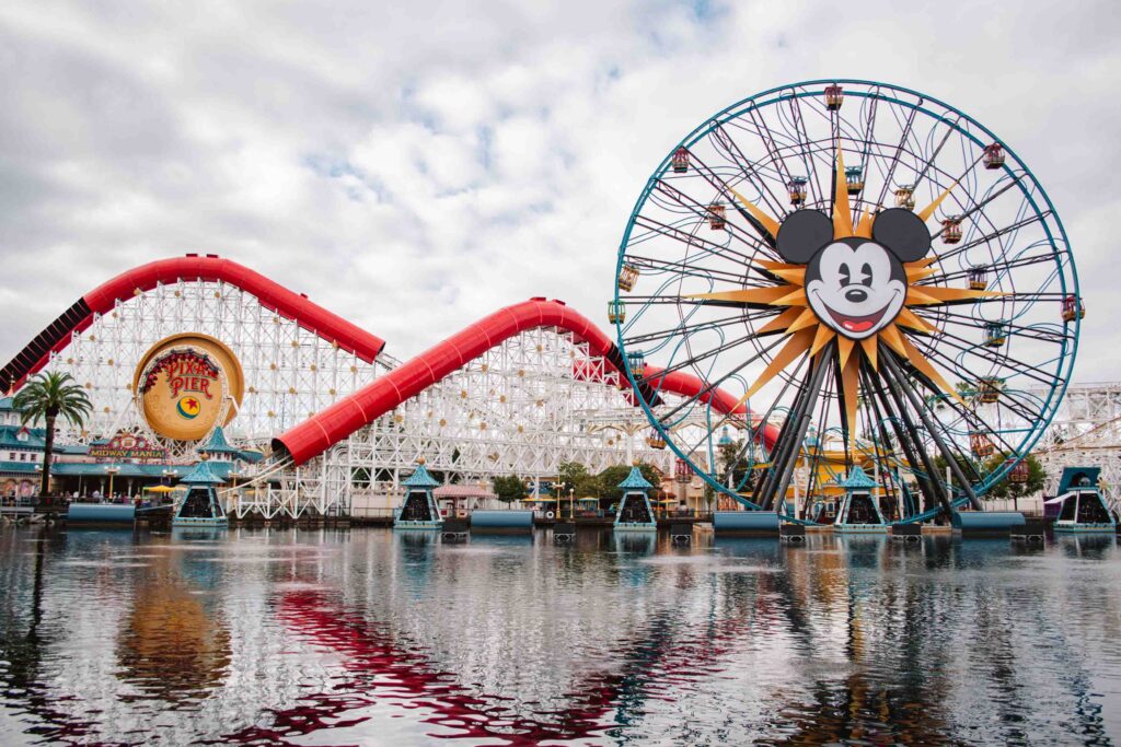California Adventure lake view of Pixar Pier Pal-a-Round and Incredicoaster on a partly cloudy day